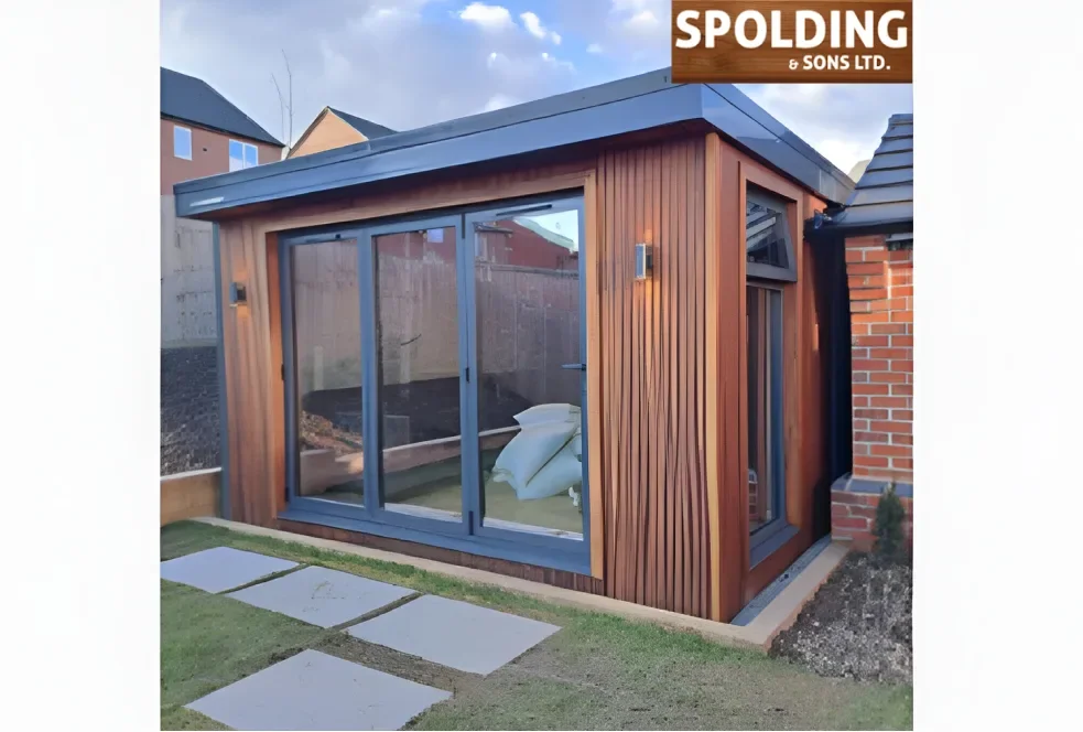 A Facebook ad from Spolding and Sons showing a garden room, with copy about turning unused garden space into a light-filled room.